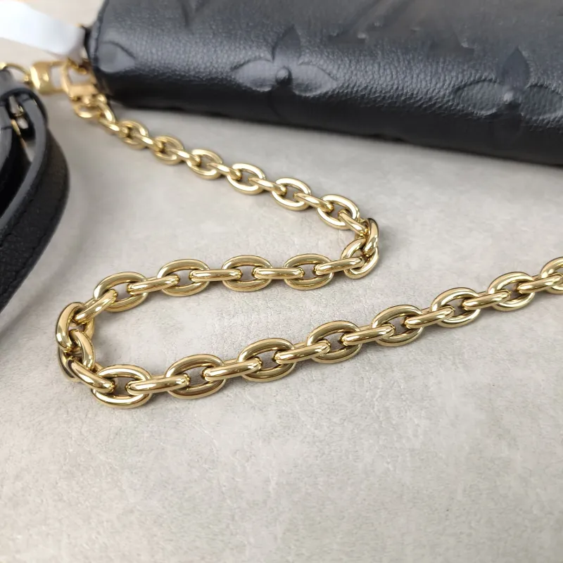 Louis Vuitton Crossbody Bag IVY Black Empreinte Embossed Calfskin Small 23.5 × 4.3 × 12 cm — detail view 10 of 13