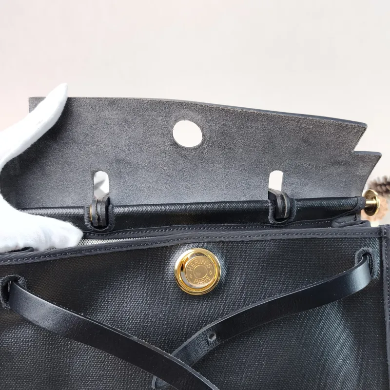 Hermès Crossbody Bag Herbag 31 Black Canvas Medium 30.5 × 11 × 25.5 cm W — detail view 1 of 12