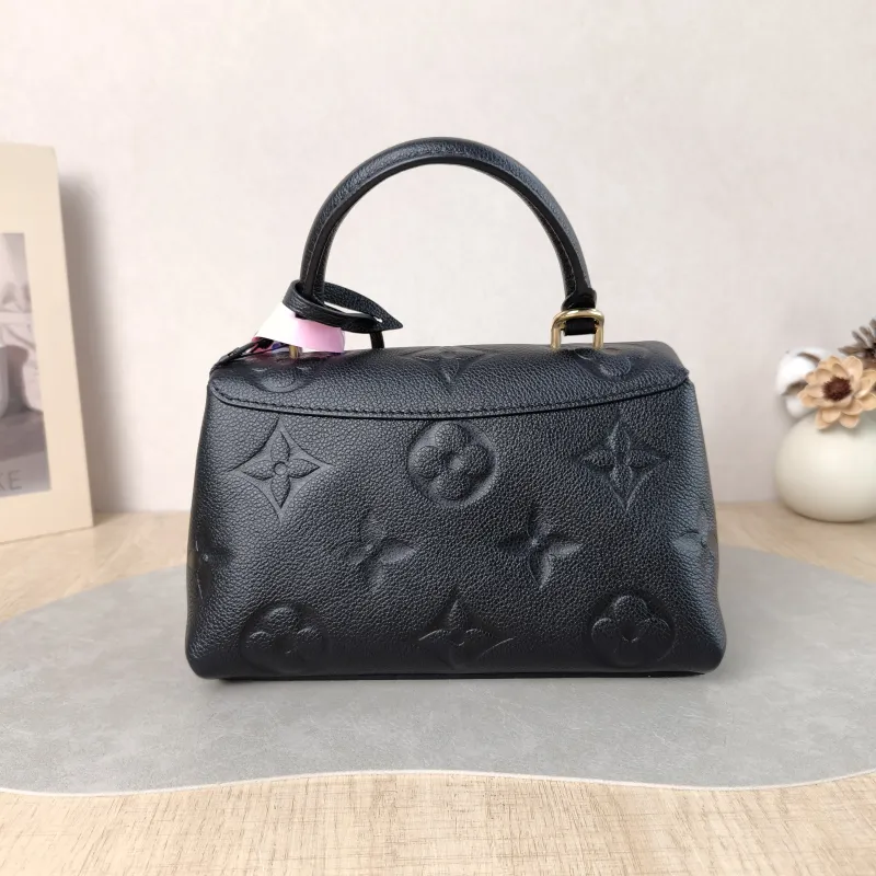 Louis Vuitton Crossbody Bag MADELEINE Black Monogram Empreinte Embossed Calfskin BB 24 × 8.5 × 17 cm — cover view 4 of 5