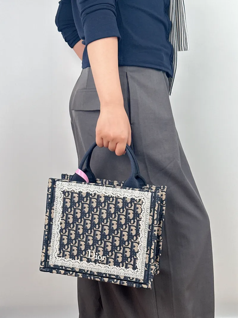 DIOR Shoulder Bag Book Tote Shoulder Strap Edition Blue Canvas Small 26.5 × 14 × 22 cm — on-model view 1 of 2