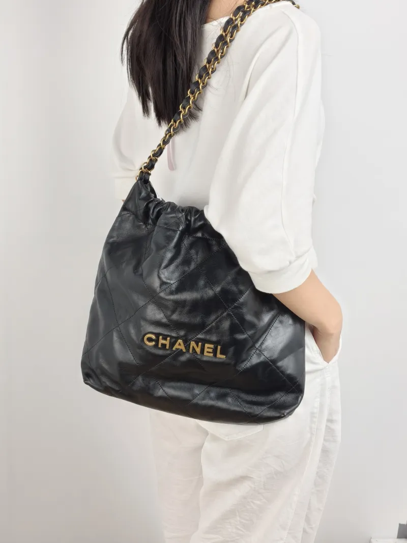 Chanel Shoulder Bag 22Bag Black CC alfskin Small 35 × 7 × 37 cm — on-model view 2 of 2