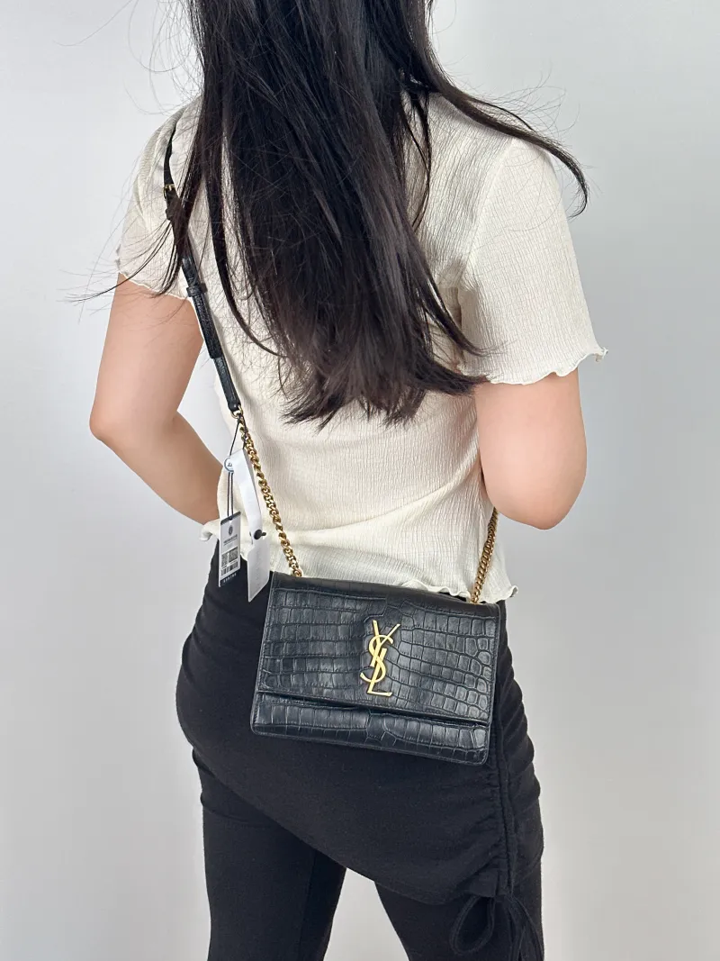 SAINT LAURENT Crossbody Bag SUNSET Black with Gold-Tone Hardware Calfskin Small19.5 × 8 × 14 cm — on-model view 2 of 2