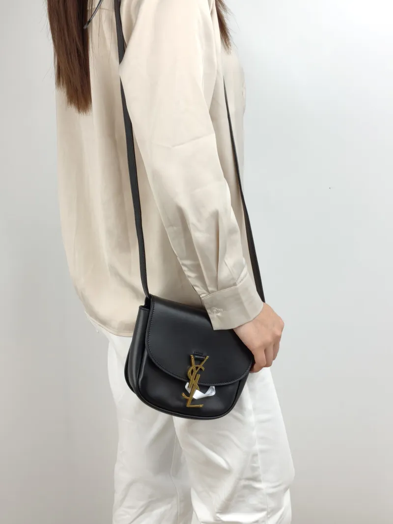 SAINT LAURENT Shoulder Bag Kaia Black Calfskin 16 × 5.5 × 15.5 cm — on-model view 1 of 2