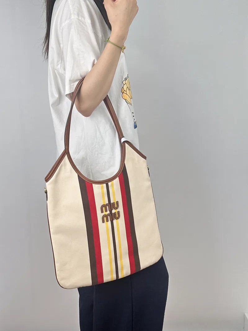 Miumiu Shoulder Bag IVY Tote Shopping Tote Canvas Medium35*40 — on-model view 1 of 2