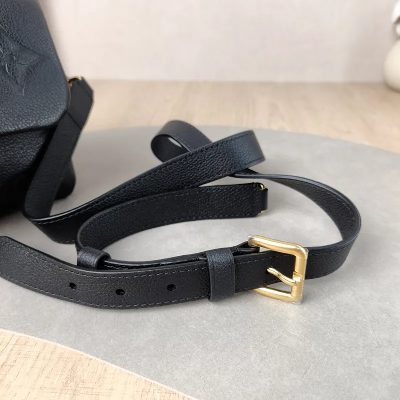 Louis Vuitton Crossbody Bag MADELEINE Black Monogram Empreinte Embossed Calfskin BB 24 × 8.5 × 17 cm — detail view 2 of 12