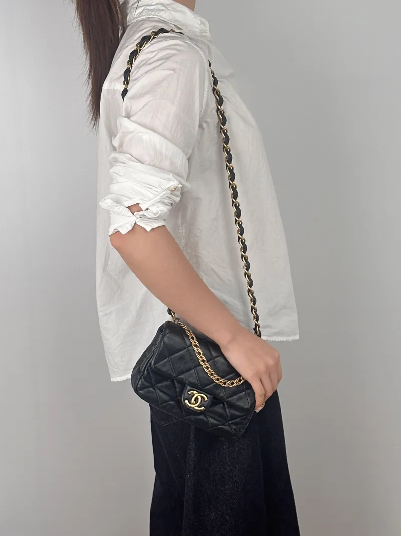 Chanel Crossbody Bag mini Black Lambskin One Size20 × 6 × 12 cm — on-model view 1 of 3