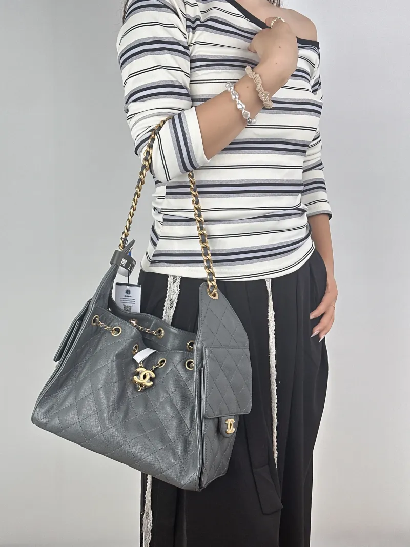 Chanel Shoulder Bag25Bag Grey Calfskin Small26 × 14 × 30 cm — on-model view 1 of 2