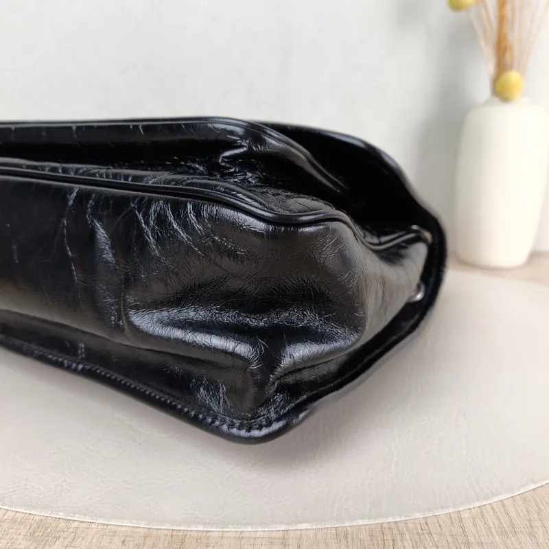 SAINT LAURENT Crossbody Bag Niki D Waxed Leather Calfskin Medium 28 × 8.5 × 20 cm — detail view 11 of 14
