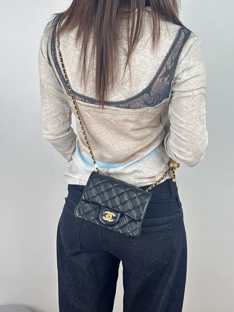 Chanel Crossbody Bag Classic Flap Mini CF Mini Black with Gold-Tone Hardware SL ambskinmini17 × 8 × 13.5 cm — on-model view 1 of 2