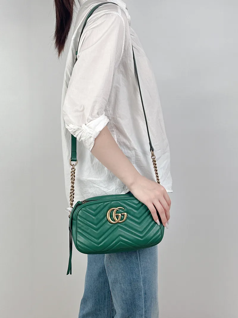 GUCCI Crossbody Bag GG Marmont Marmont Camera Bag Green Calfskin Small24 × 7 × 13 cm — on-model view 2 of 2