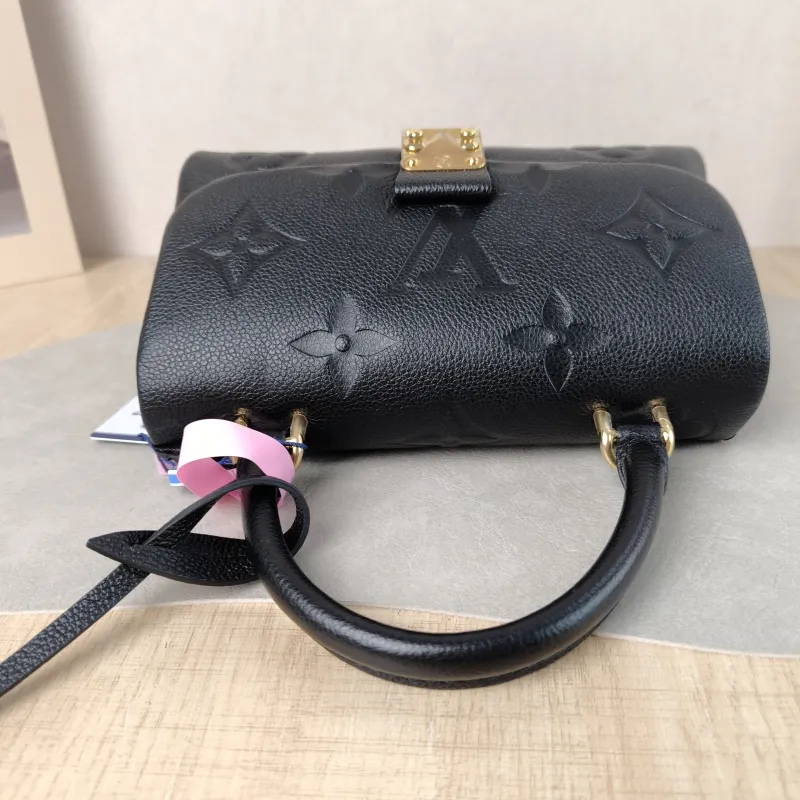 Louis Vuitton Crossbody Bag MADELEINE Black Monogram Empreinte Embossed Calfskin BB 24 × 8.5 × 17 cm — detail view 4 of 12