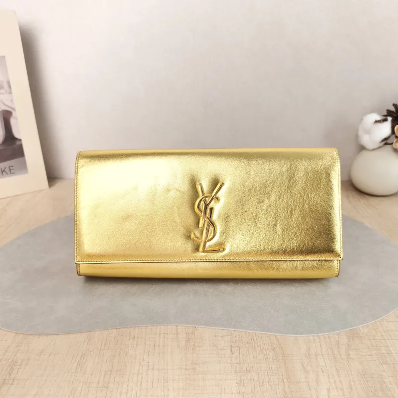 SAINT LAURENT Clutch Clutch Gold Calfskin 27 × 4 × 13 cm