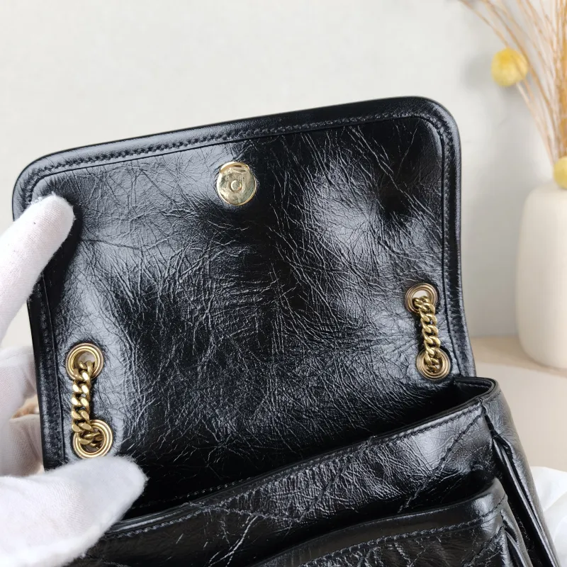 SAINT LAURENT Crossbody Bag Niki Black Waxed Leather Calfskin Mini 18 × 5 × 12.5 cm — detail view 7 of 12