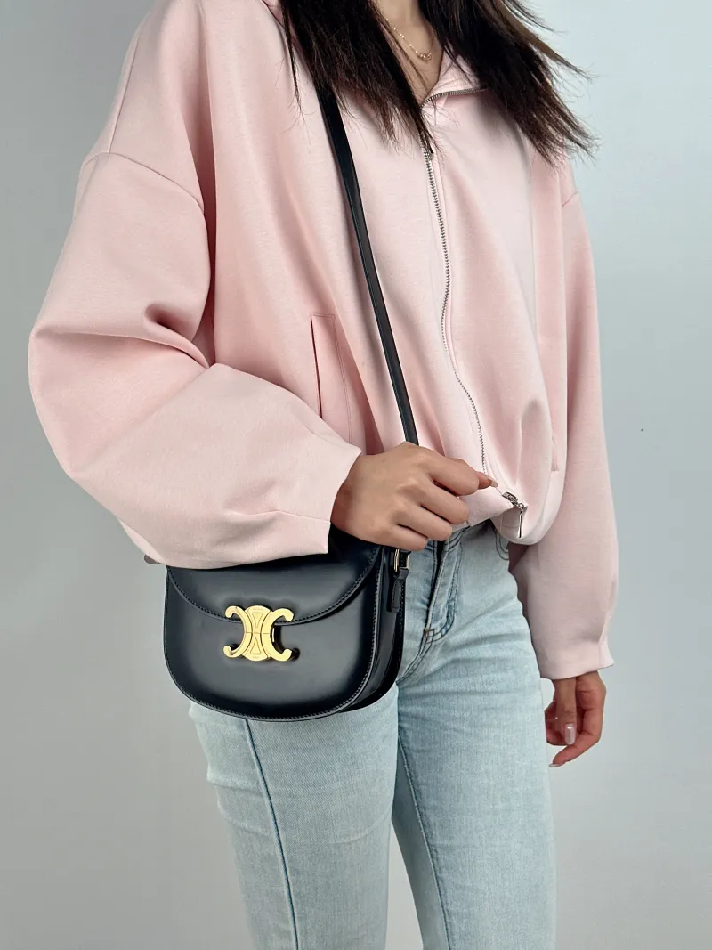 CELINE Crossbody Bag TEEN BESACE TRIOMPHE Black Calfskin Small 18.5 × 6 × 16 cm — on-model view 1 of 2