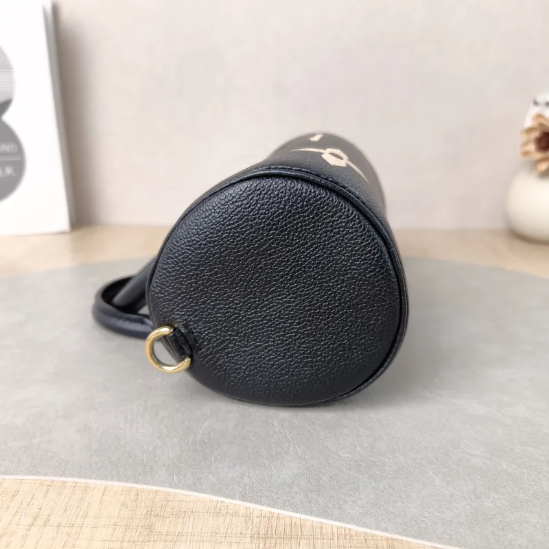 Louis Vuitton Crossbody Bag Papillon Black · White Monogram Empreinte Embossed Calfskin BB 20 × 10 × 10 cm — detail view 7 of 11