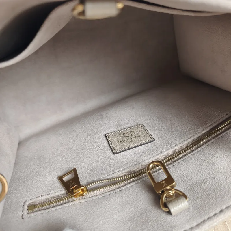 Louis Vuitton Shoulder Bag Onthego · White Monogram Empreinte Embossed Calfskin Small 25 × 11.5 × 19 cm — detail view 3 of 10