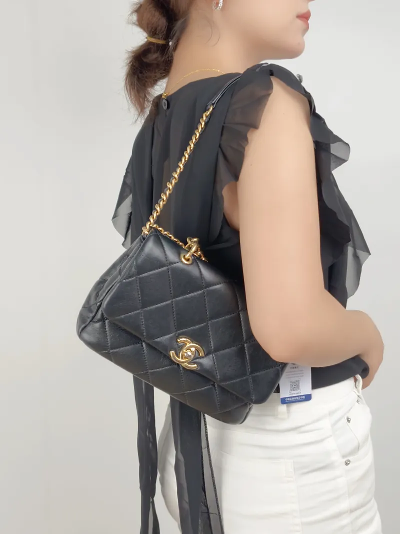 Chanel Crossbody Bag24b Black Lambskin One Size21 × 5 × 15 cm — on-model view 2 of 3