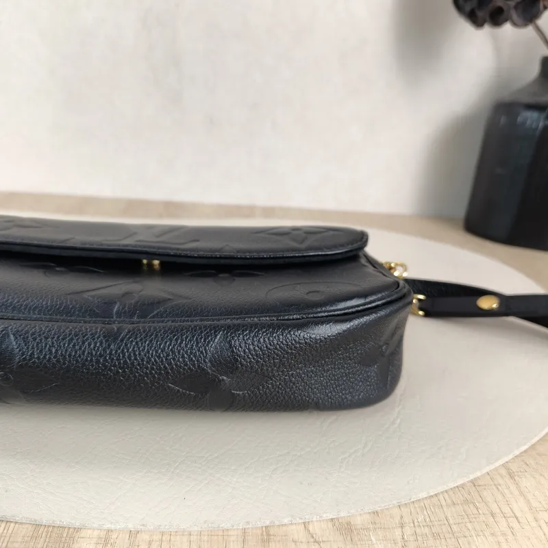 Louis Vuitton Crossbody Bag IVY Black Empreinte Embossed Calfskin Small 23.5 × 4.3 × 12 cm — detail view 1 of 13