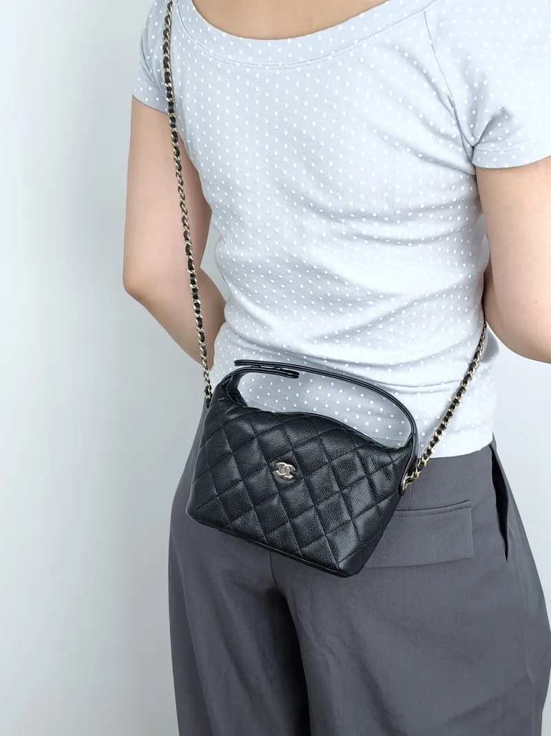 Chanel Crossbody Bag Crossbody Bag Black Grained Calfskin One Size21.5 × 7.5 × 19 cm — on-model view 2 of 3