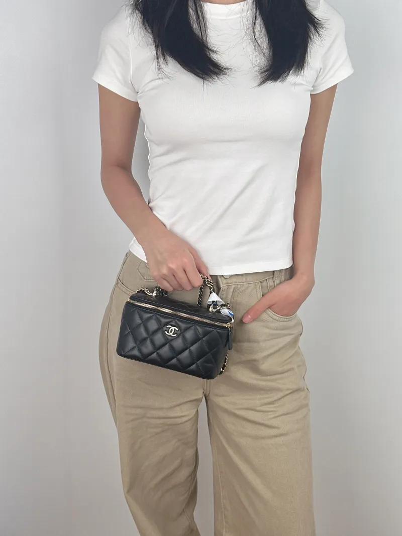 Chanel Crossbody Bag Edition Black with Gold-Tone Hardware Lambskin Mini 16 × 8 × 9.5 cm — on-model view 3 of 3