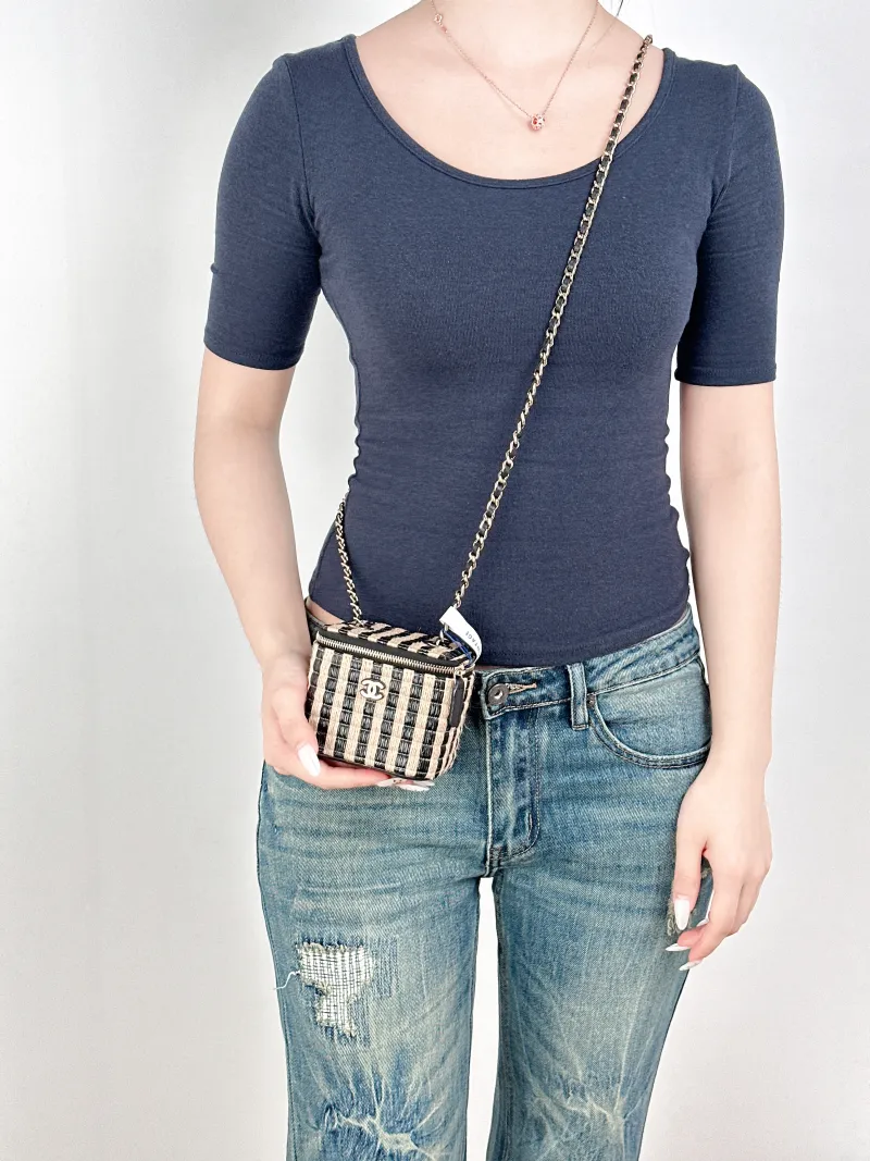 Chanel Crossbody Bag Edition Black Wovenmini11 × 7 × 9 cm — on-model view 1 of 2