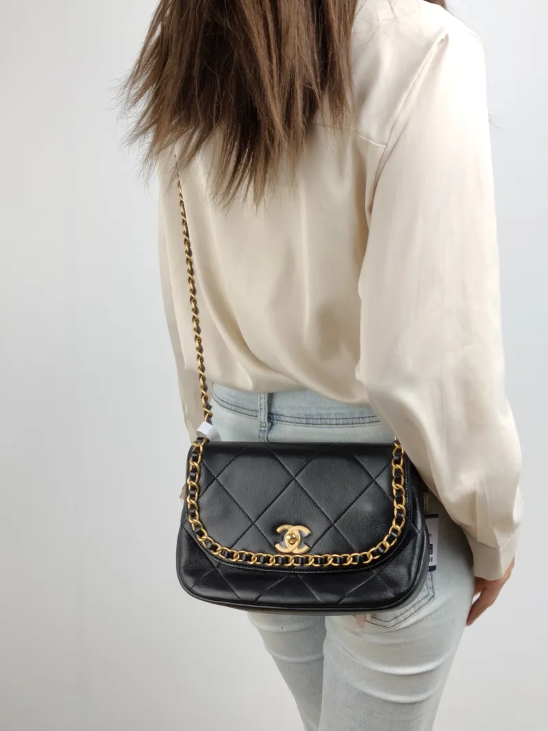 Chanel Crossbody Bag Crossbody Bag Black with Gold-Tone Hardware Lambskin One Size 24 × 6 × 15 cm — on-model view 1 of 2