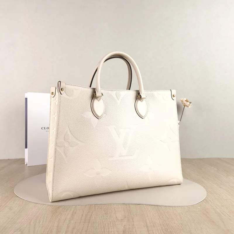 Louis Vuitton Shoulder Bag Onthego Medium White Monogram Empreinte Embossed Calfskin Medium 35 × 14 × 27 cm — cover view 4 of 4