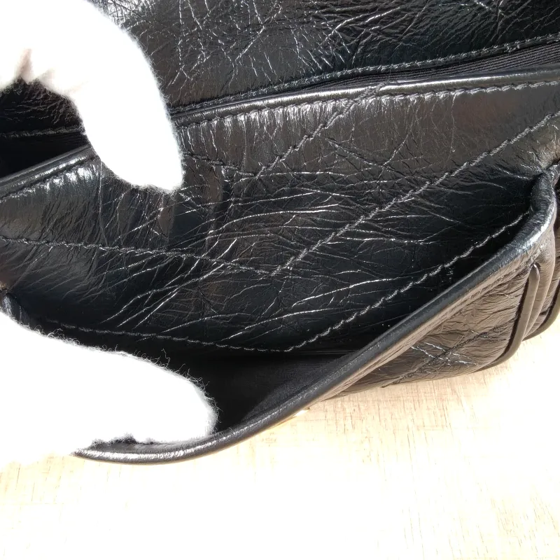 SAINT LAURENT Crossbody Bag Niki Black Waxed Leather Calfskin Mini 18 × 5 × 12.5 cm — detail view 7 of 13