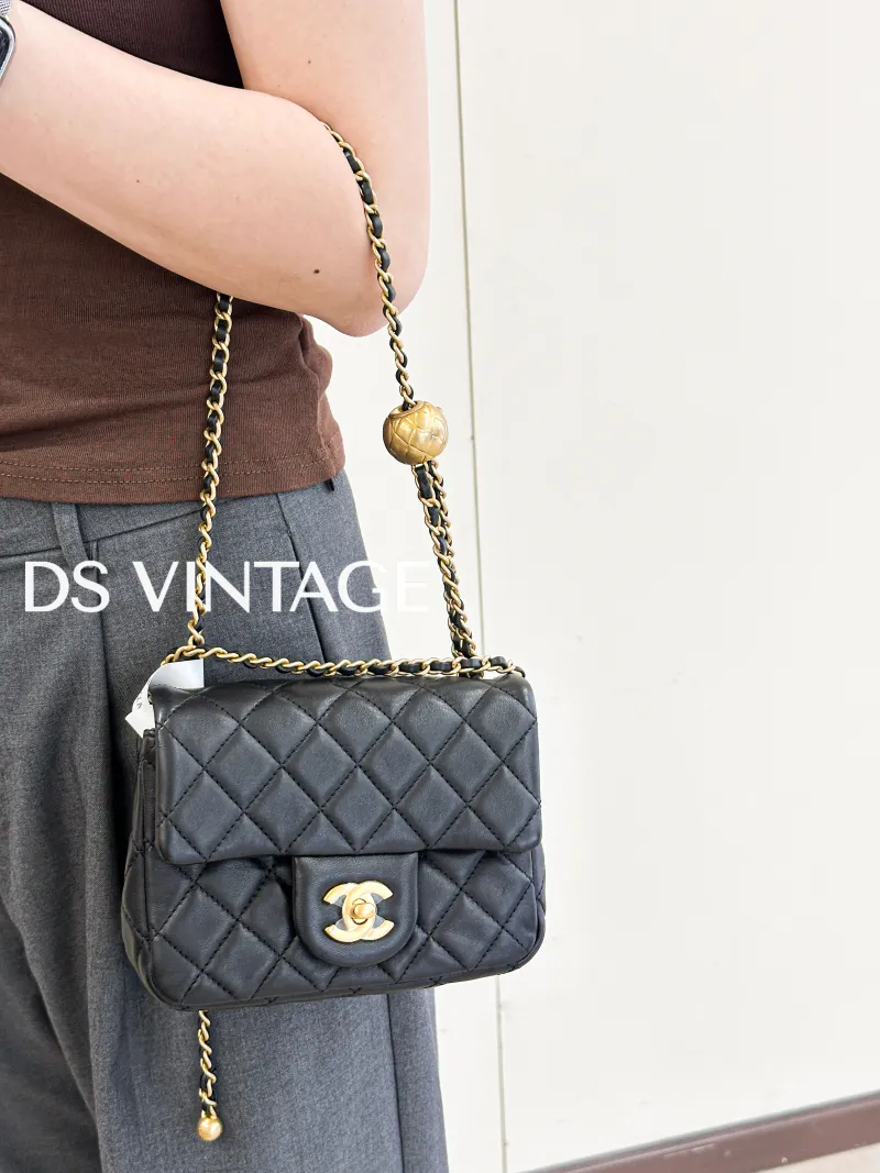 Chanel Crossbody Bag Classic Flap Mini CF Mini Black with Gold-Tone Hardware SL ambskin Mini 17 × 8 × 13.5 cm — on-model view 3 of 3