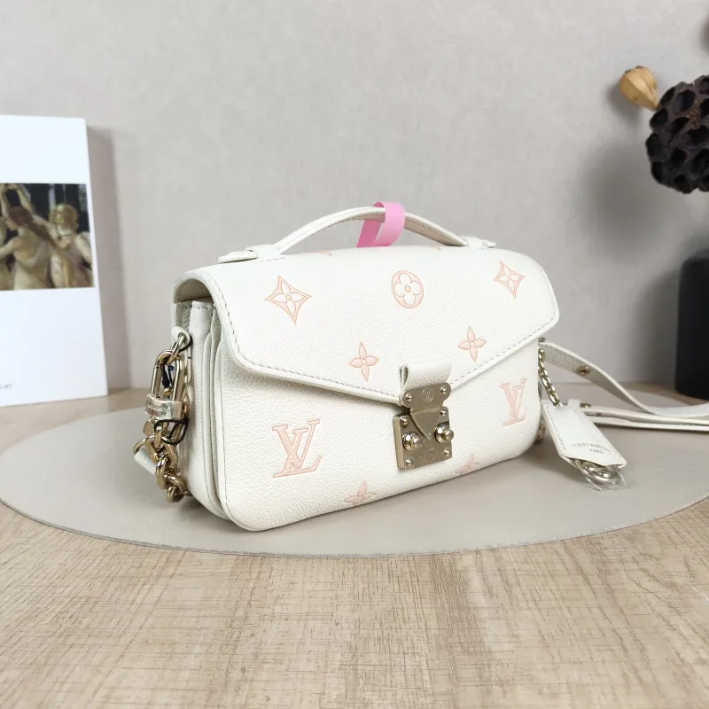 Louis Vuitton Crossbody Bag Pochette Métis East West White · Pink Monogram Empreinte Embossed Calfskin Small21.5 × 6 × 13.5 cm — cover view 5 of 5