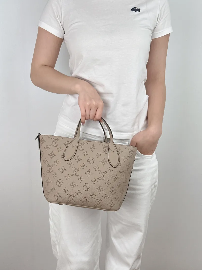 Louis Vuitton Crossbody Bag Blossom Top Handle Bag Calfskin Small20 × 12.5 × 20 cm — on-model view 1 of 2