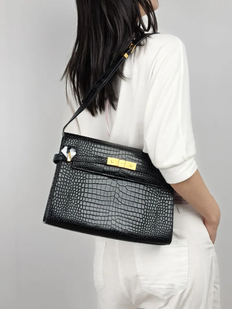 SAINT LAURENT Shoulder Bag MANHATTAN Black Embossed Calfskin Medium 29 × 7.5 × 20 cm — on-model view 2 of 2