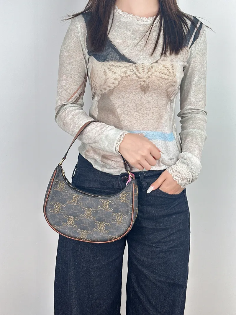 CELINE Shoulder Bag AVA Embroidered Edition PVC 23 × 6 × 13.5 cm — on-model view 2 of 2