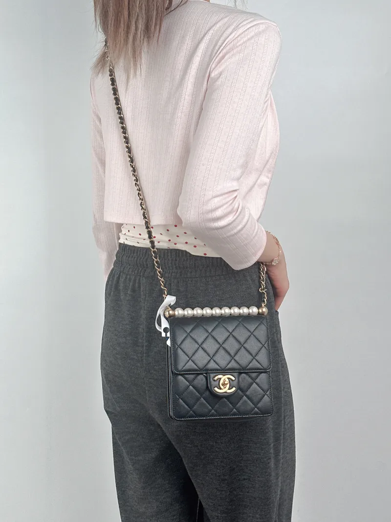 Chanel Crossbody Bag Crossbody Bag Black Calfskin15.5 × 5 × 15 cm — on-model view 2 of 3