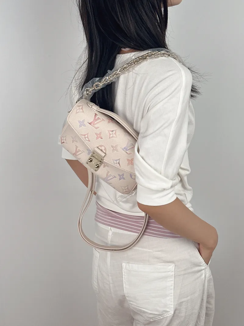 Louis Vuitton Crossbody Bag Pochette Métis East West Empreinte Embossed Calfskin Small 21.5 × 6 × 13.5 cm — on-model view 4 of 4