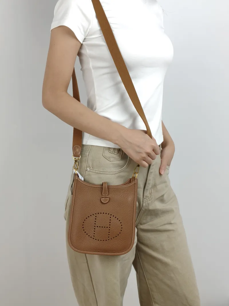 Hermès Crossbody Bag Evelyne Mini 16 Mini 16 Taurillon Clemence TC Calfskin Mini 17 × 5.5 × 18 cm W — on-model view 2 of 2