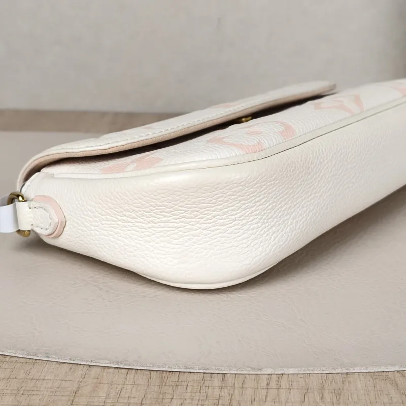 Louis Vuitton Crossbody Bag IVY White · Pink Empreinte Embossed Calfskin Monogram Small23.5 × 4.3 × 12 cm — detail view 4 of 13