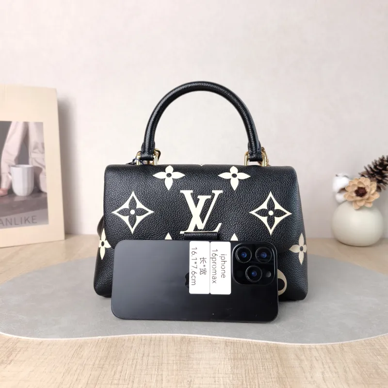 Louis Vuitton Crossbody Bag MADELEINE Black · White Monogram Empreinte Embossed Calfskin BB 24 × 8.5 × 17 cm — cover view 4 of 6