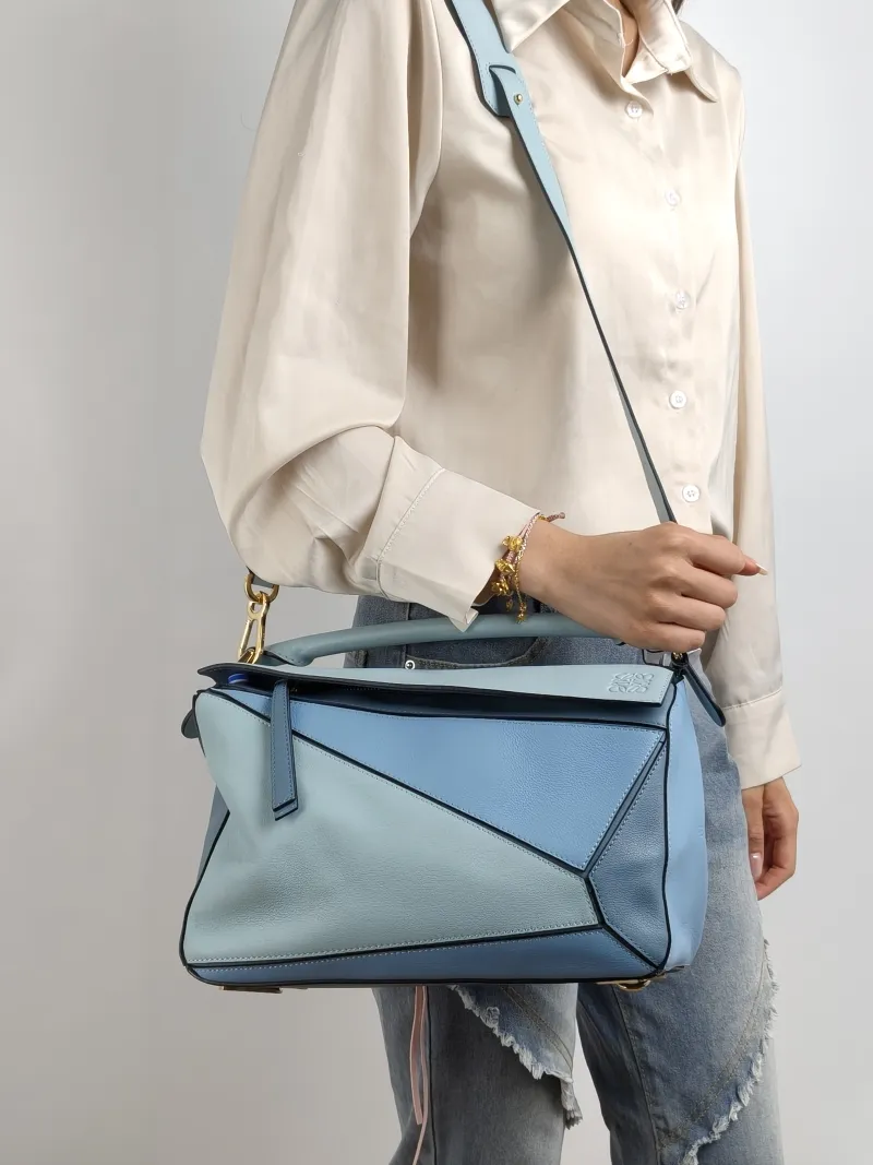 LOEWE Crossbody Bag Puzzle Blue Calfskin Medium 29 × 14 × 19.5 cm — on-model view 1 of 2