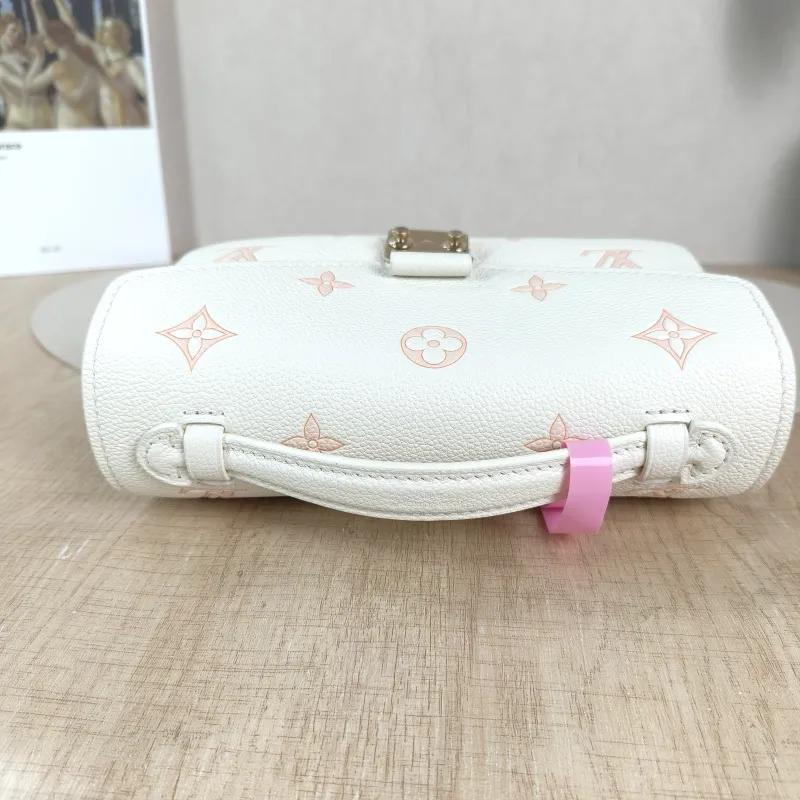 Louis Vuitton Crossbody Bag Pochette Métis East West White · Pink Monogram Empreinte Embossed Calfskin Small 21.5 × 6 × 13.5 cm — detail view 3 of 13
