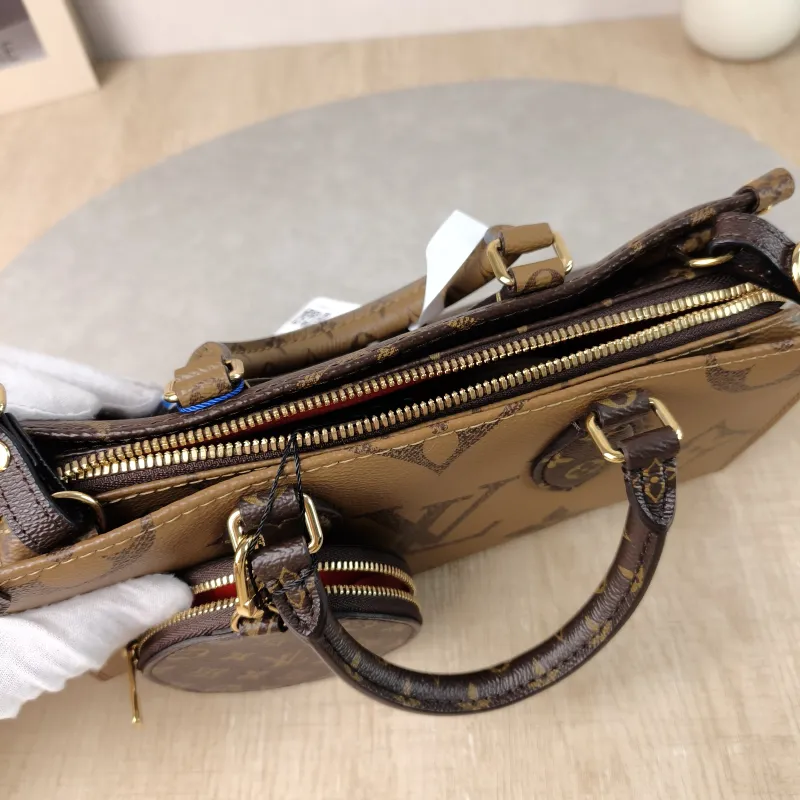 Louis Vuitton Crossbody Bag Onthego East West Monogram PVC Small 25 × 10 × 13 cm — detail view 1 of 16