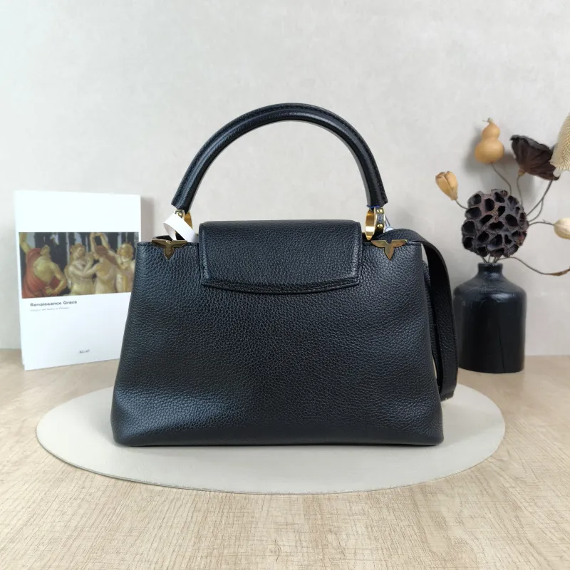 Louis Vuitton Top Handle Bag Capucines Black · Calfskin Medium31.5 × 11 × 20 cm — cover view 6 of 6