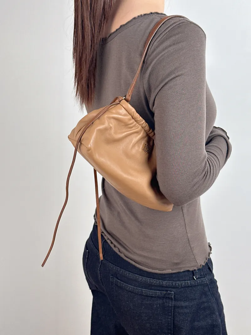 Miumiu Shoulder Bag Aventure Shoulder Bag Caramel Lambskin 22 × 9 × 11 cm — on-model view 1 of 2
