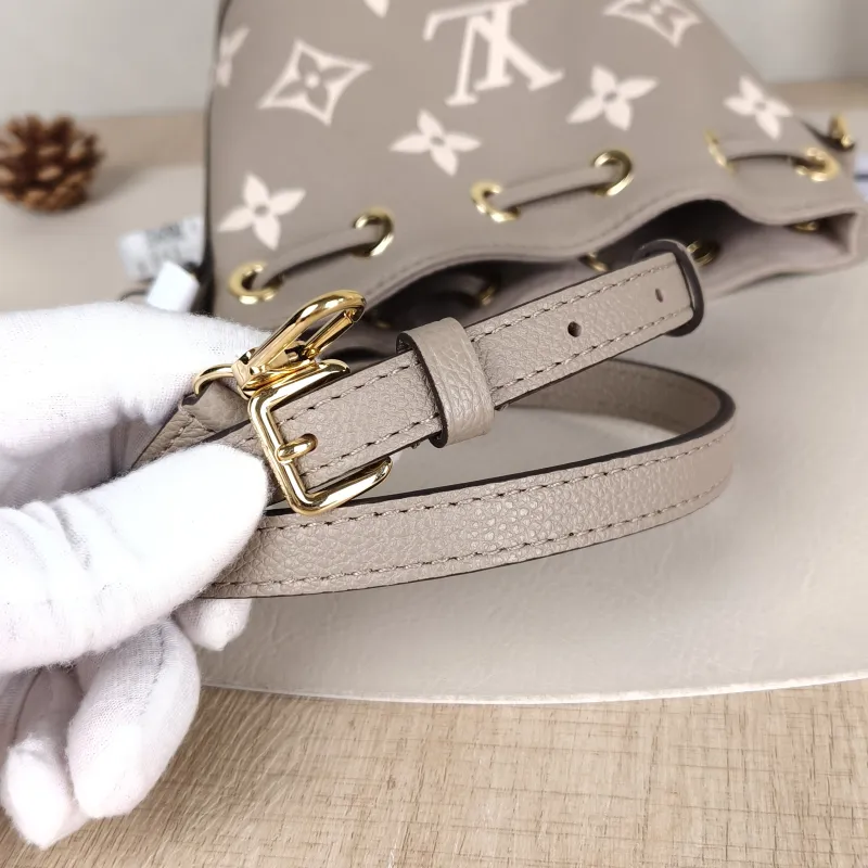 Louis Vuitton Crossbody Bag NANO NOÉ Bucket Bag Nano · White Monogram Empreinte Embossed Calfskin nano 13 × 10 × 16 cm — detail view 8 of 11