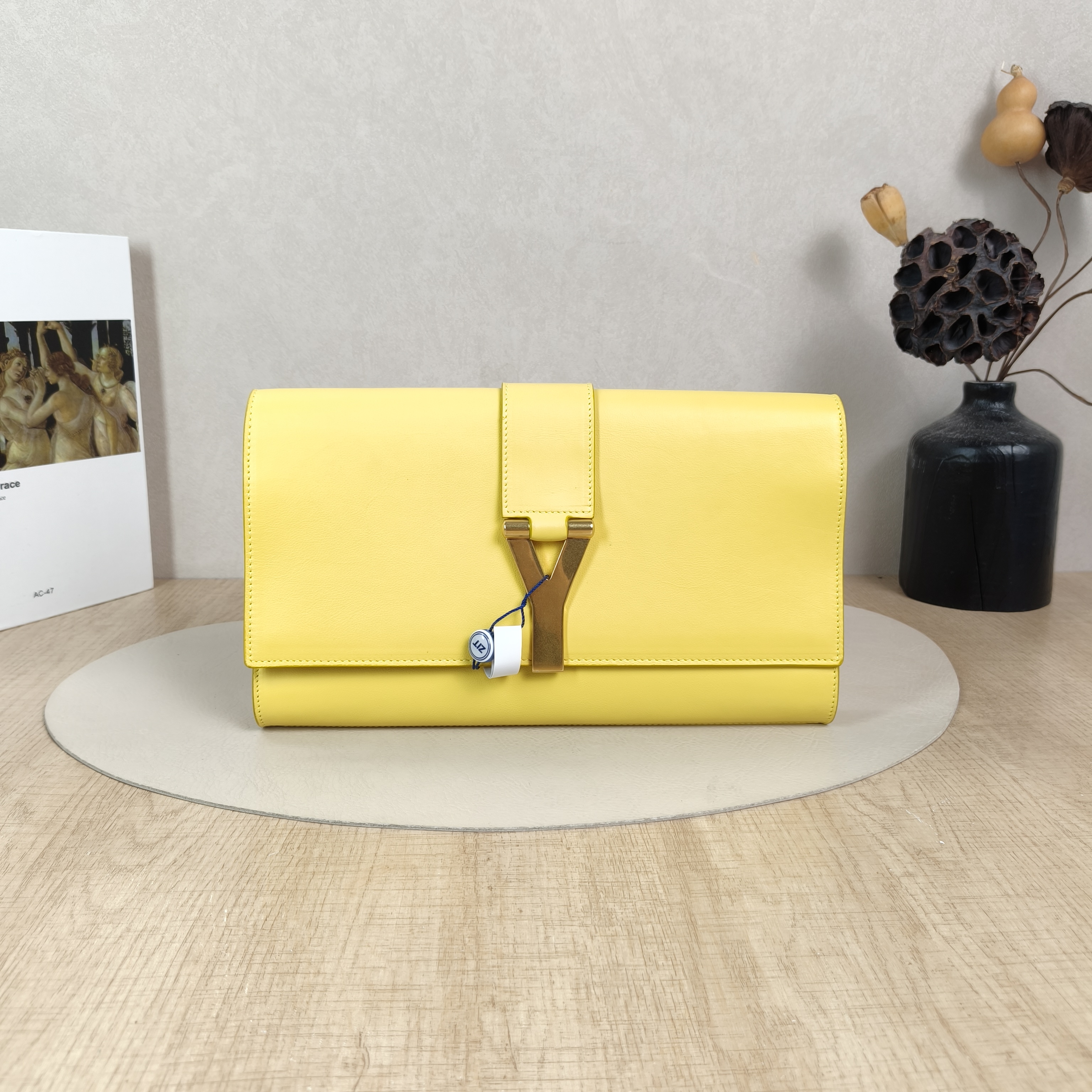 SAINT LAURENT Clutch Clutch Yellow Calfskin One Size28 × 2.5 × 16 cm