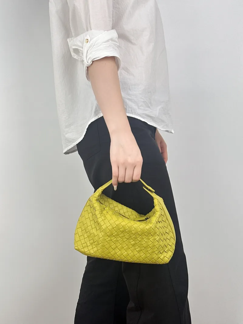 Bottega Veneta Top Handle Bag Wallace Woven Vanity Case Bag Green Calfskin Medium20 × 9.5 × 13 cm — on-model view 1 of 2
