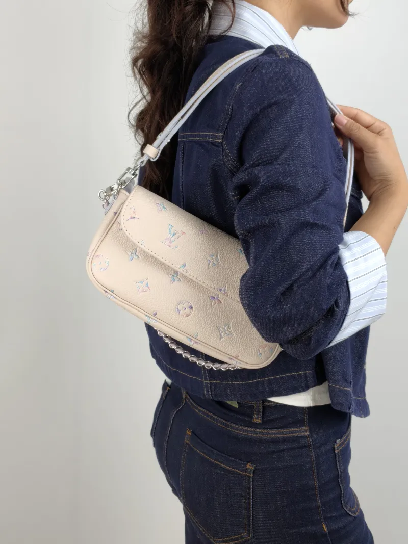 Louis Vuitton Crossbody Bag IVY Calfskin Small 23.5 × 4.3 × 12 cm — on-model view 2 of 2