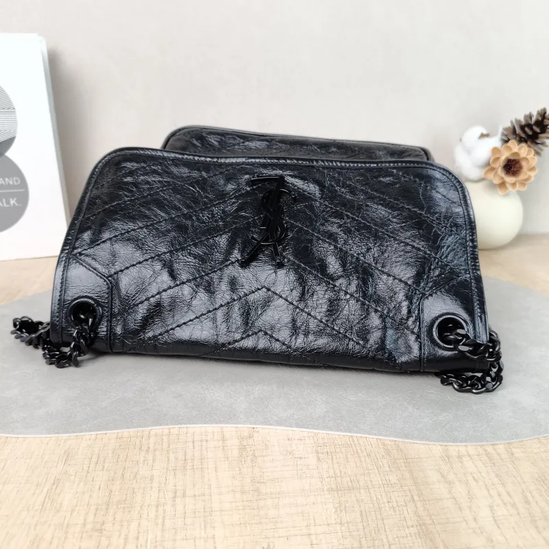 SAINT LAURENT Crossbody Bag Niki Black D Waxed Leather Calfskin Medium 28 × 8.5 × 20 cm — detail view 9 of 10