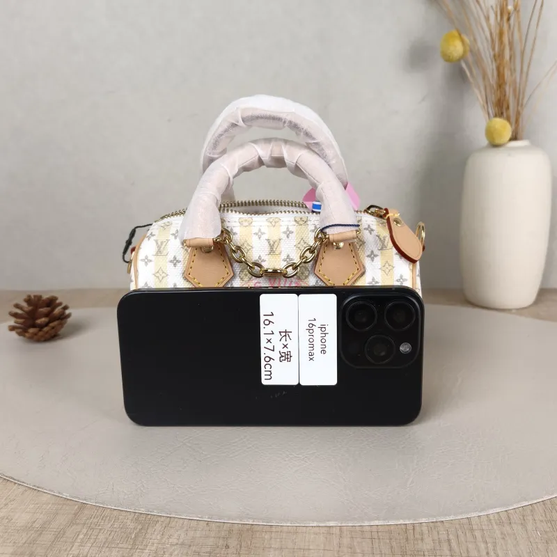 Louis Vuitton Crossbody Bag Speedy Nano White Yellow Monogram PVC nano 16 × 7.5 × 10 cm — cover view 2 of 5