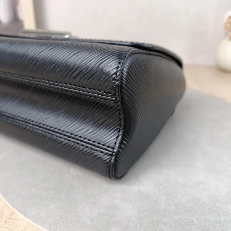 Louis Vuitton Crossbody Bag Twist Black Epi Embossed Calfskin Medium 23 × 9.5 × 17 cm — detail view 7 of 12